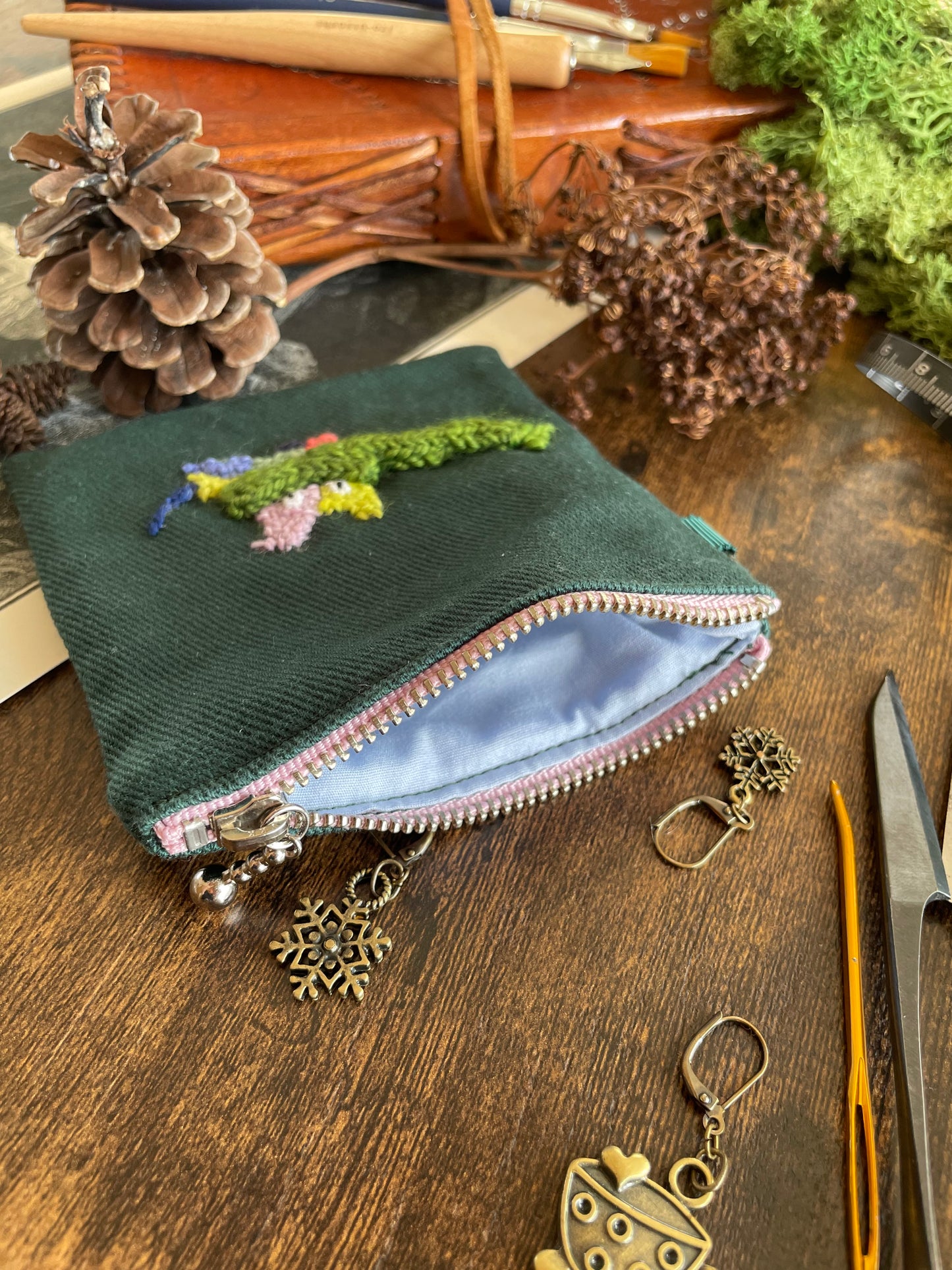 Sasha and his scarf green pouch