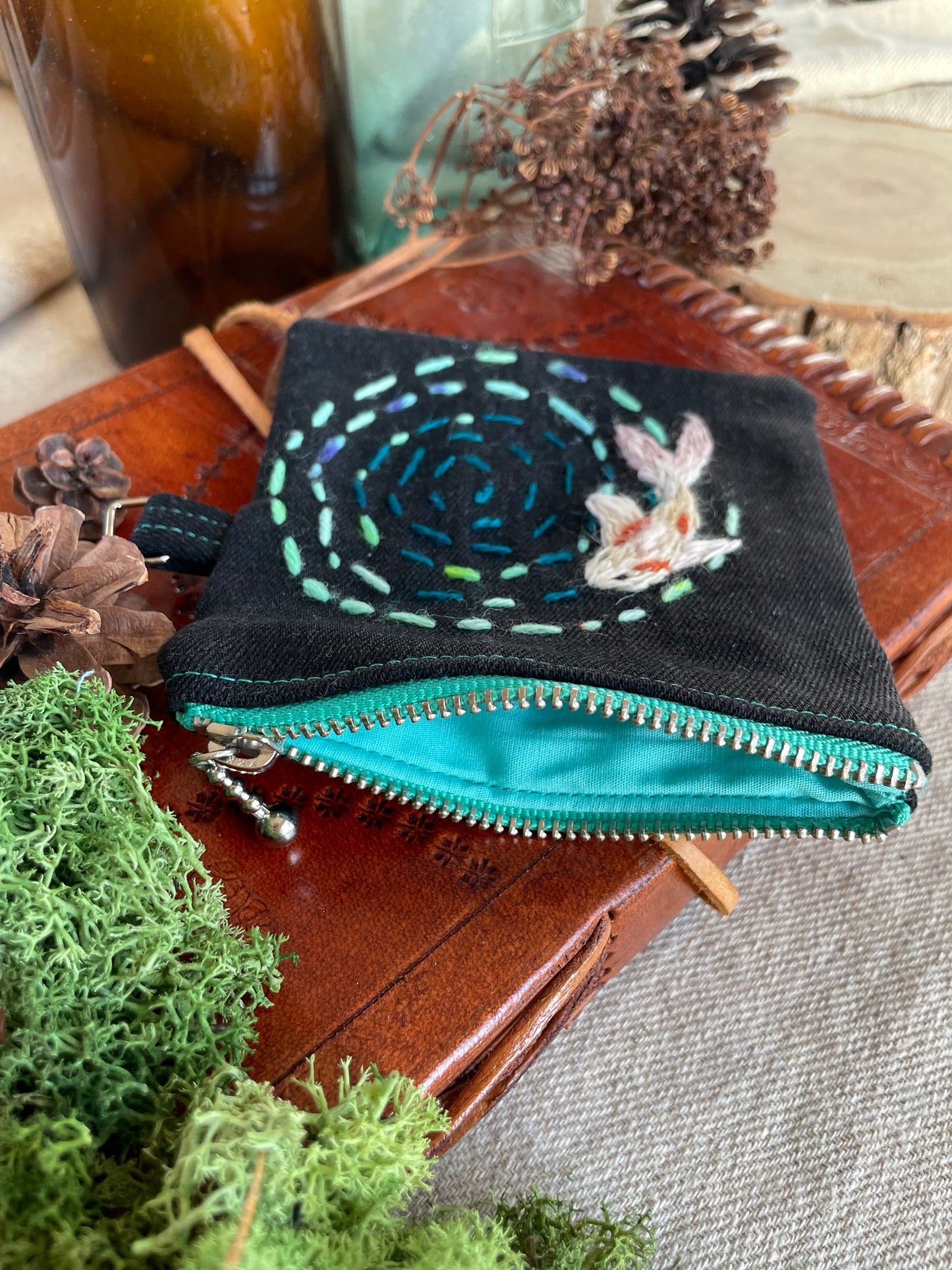 Koi pond ripples on the water zipper pouch