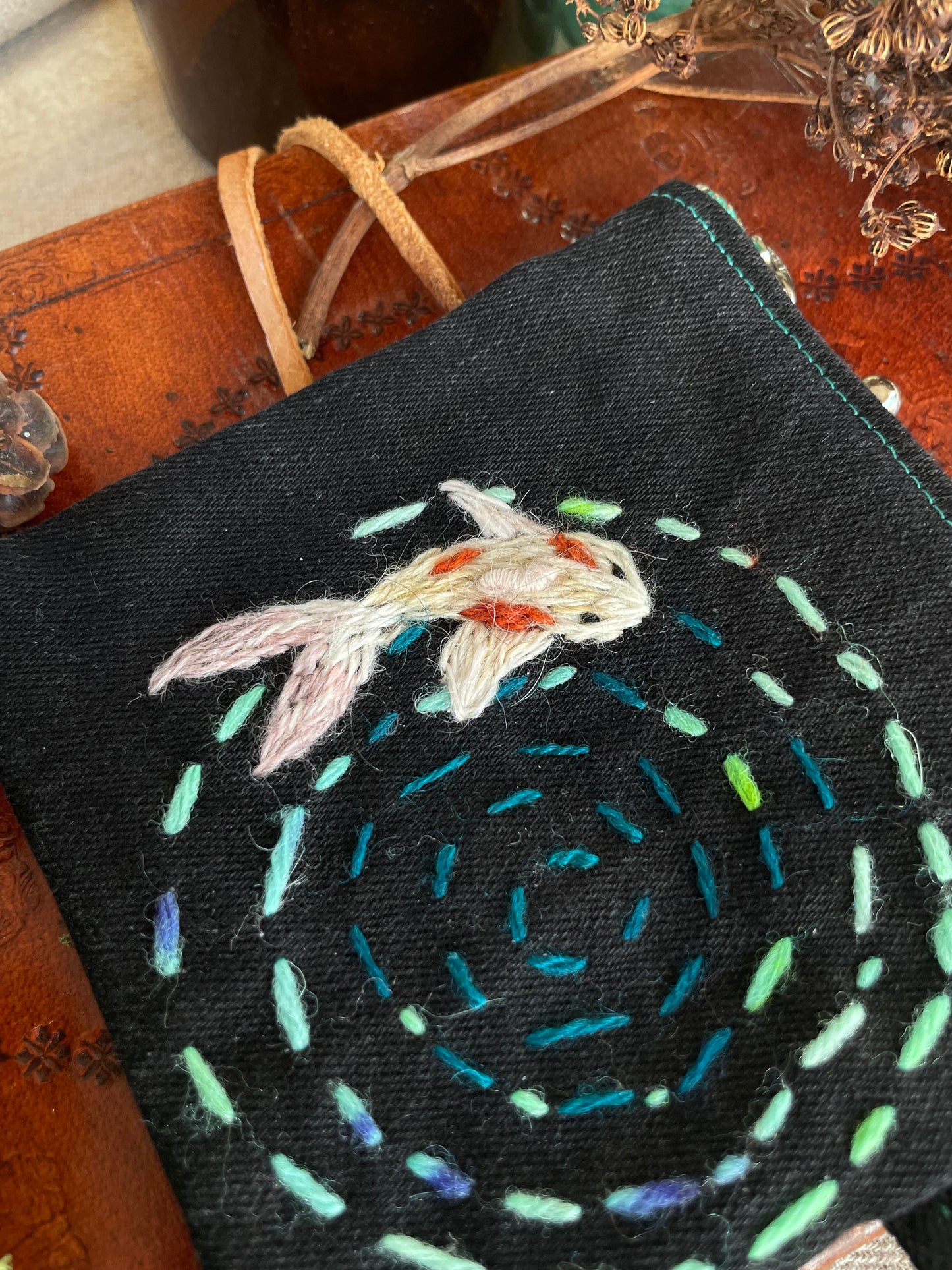 Koi pond ripples on the water zipper pouch