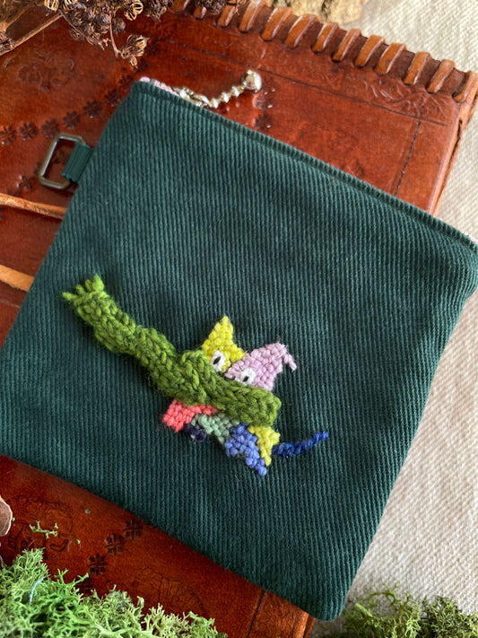 Sasha and his scarf green pouch