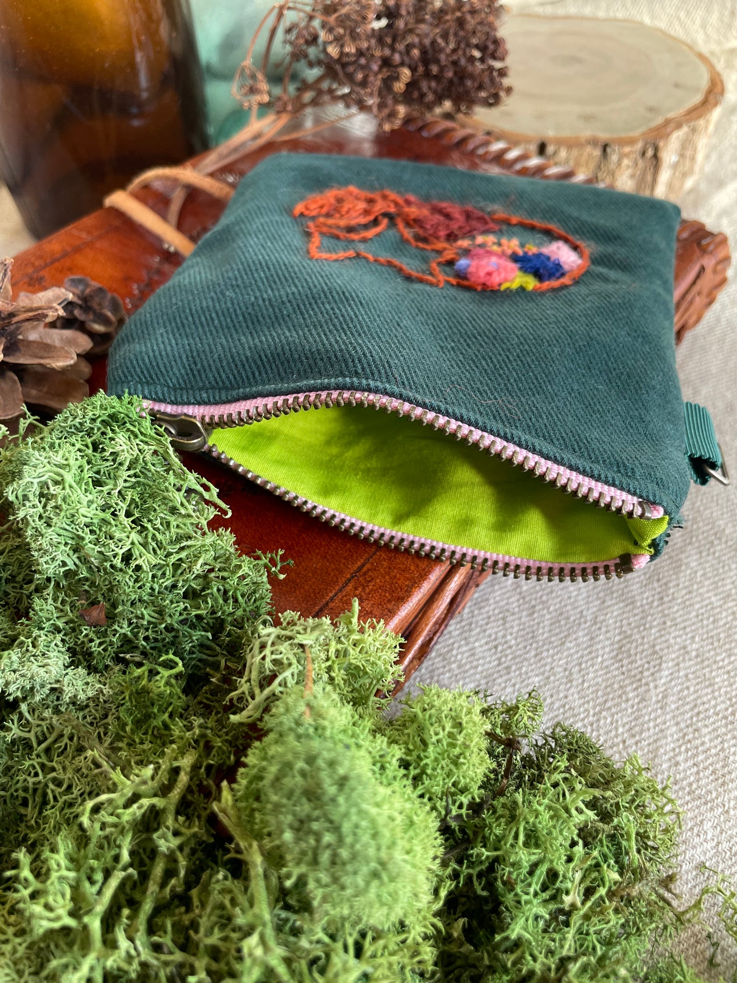 Max, the fox, sleeping with flower blooms