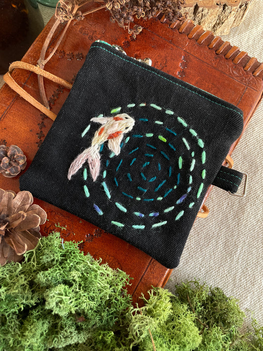 Koi pond ripples on the water zipper pouch